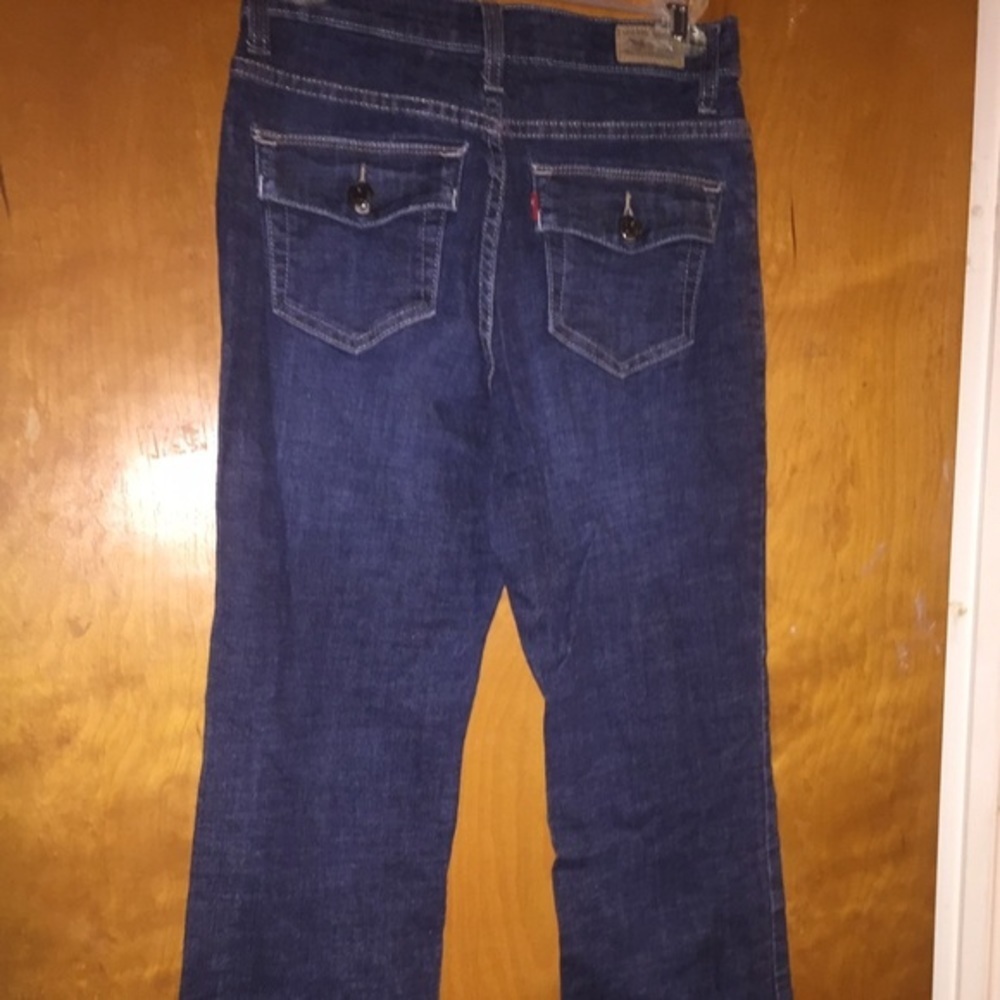 Women Levi perfectly slimming boot cut jeans rinse